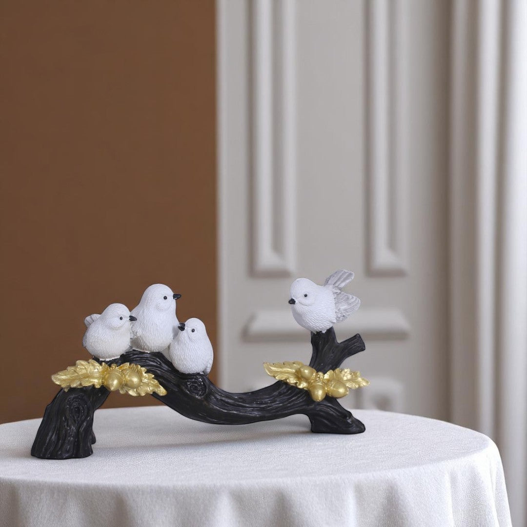 Four Sparrows On Log Statue