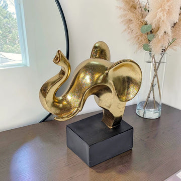 Modern Gold Abstract Elephant Statue on Black Pedestal Base