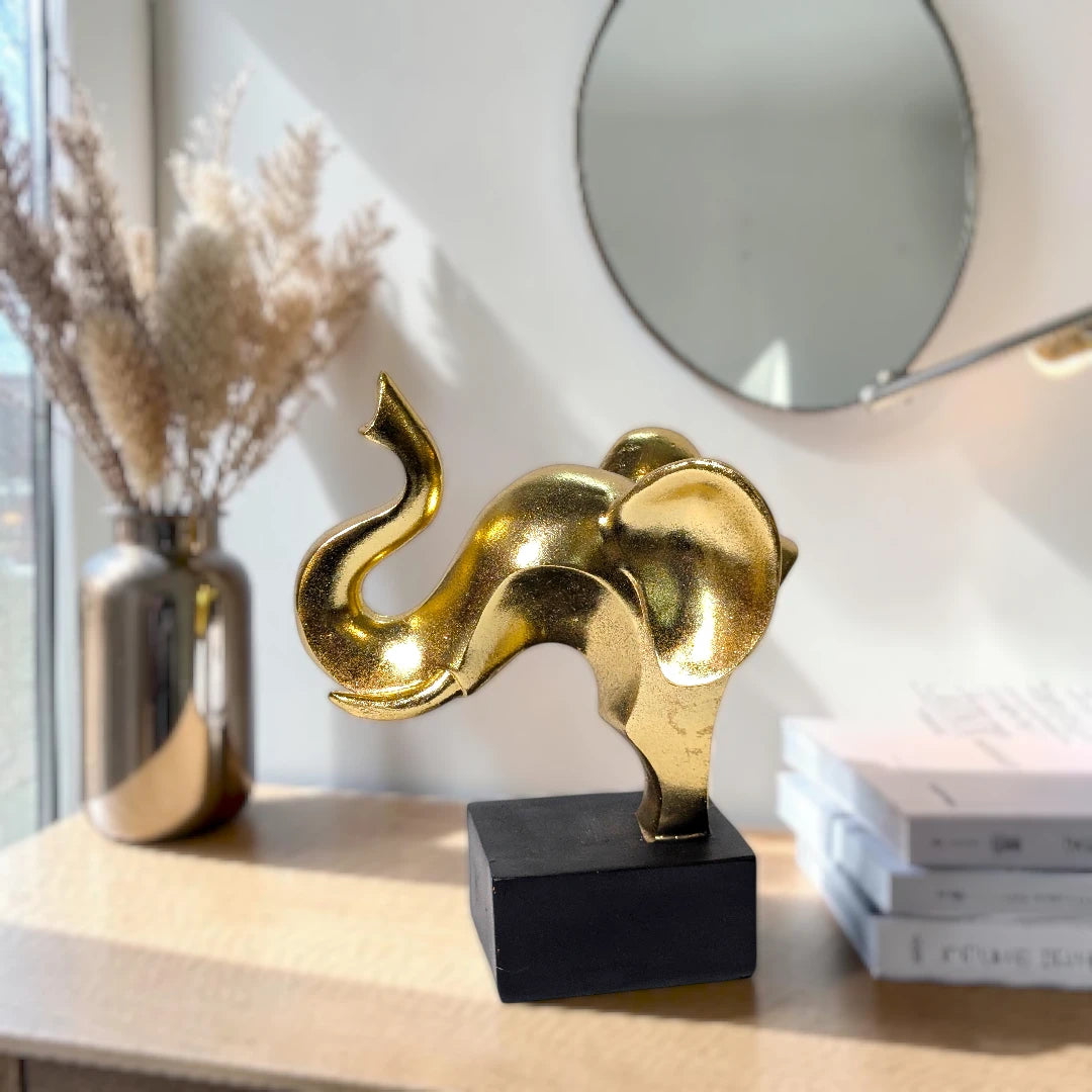 Modern Gold Abstract Elephant Statue on Black Pedestal Base